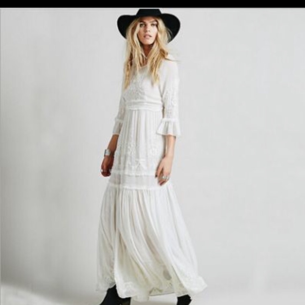 This dress is stunning! Beautiful lace work.
